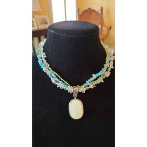 Multi-strand Beaded Necklace with Oval Pendant